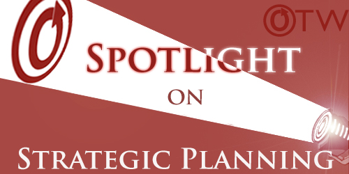 Banner by Erin of a spotlight shining the OTW logo behind the text spotlight on strategic planning
