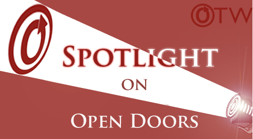 Banner by Erin of an OTW logo beamed by a spotlight over the words Open Doors
